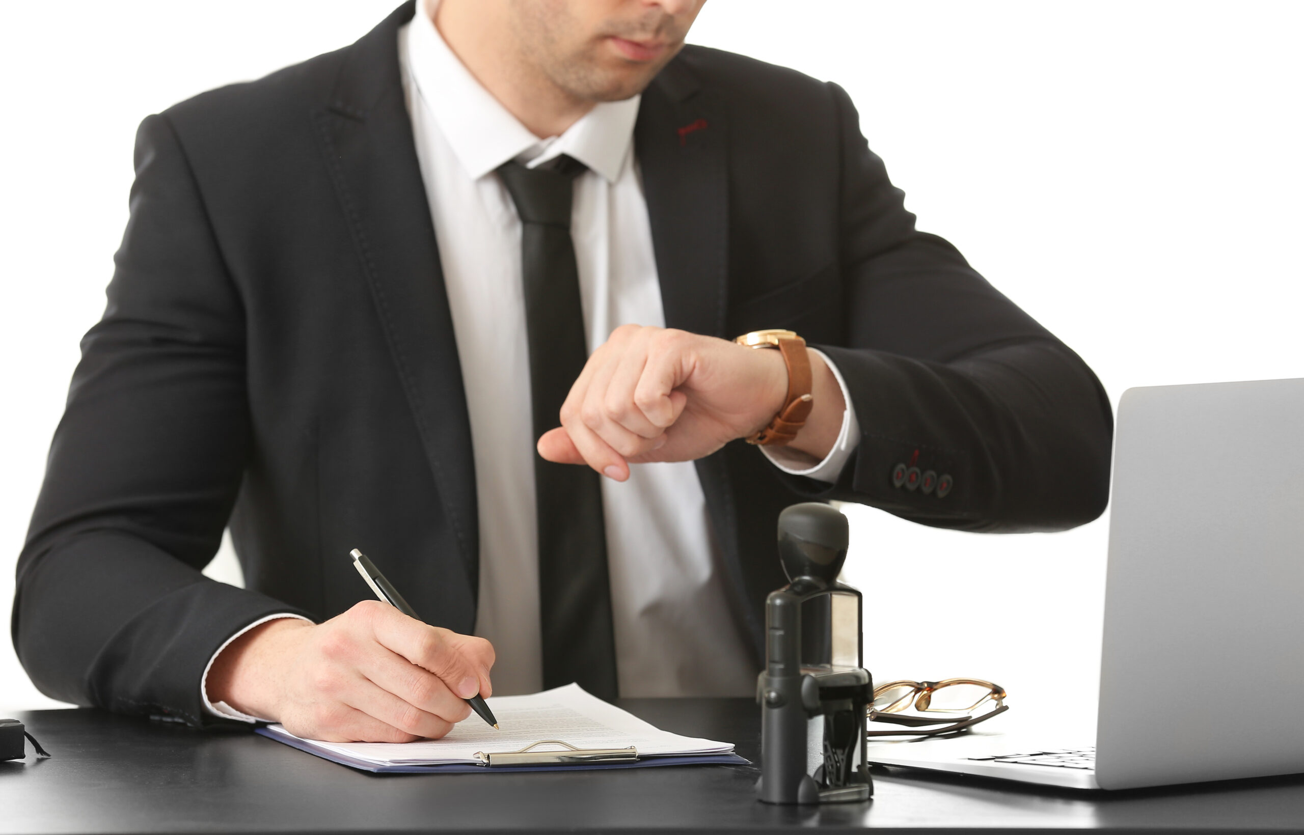 Male lawyer working with document in office