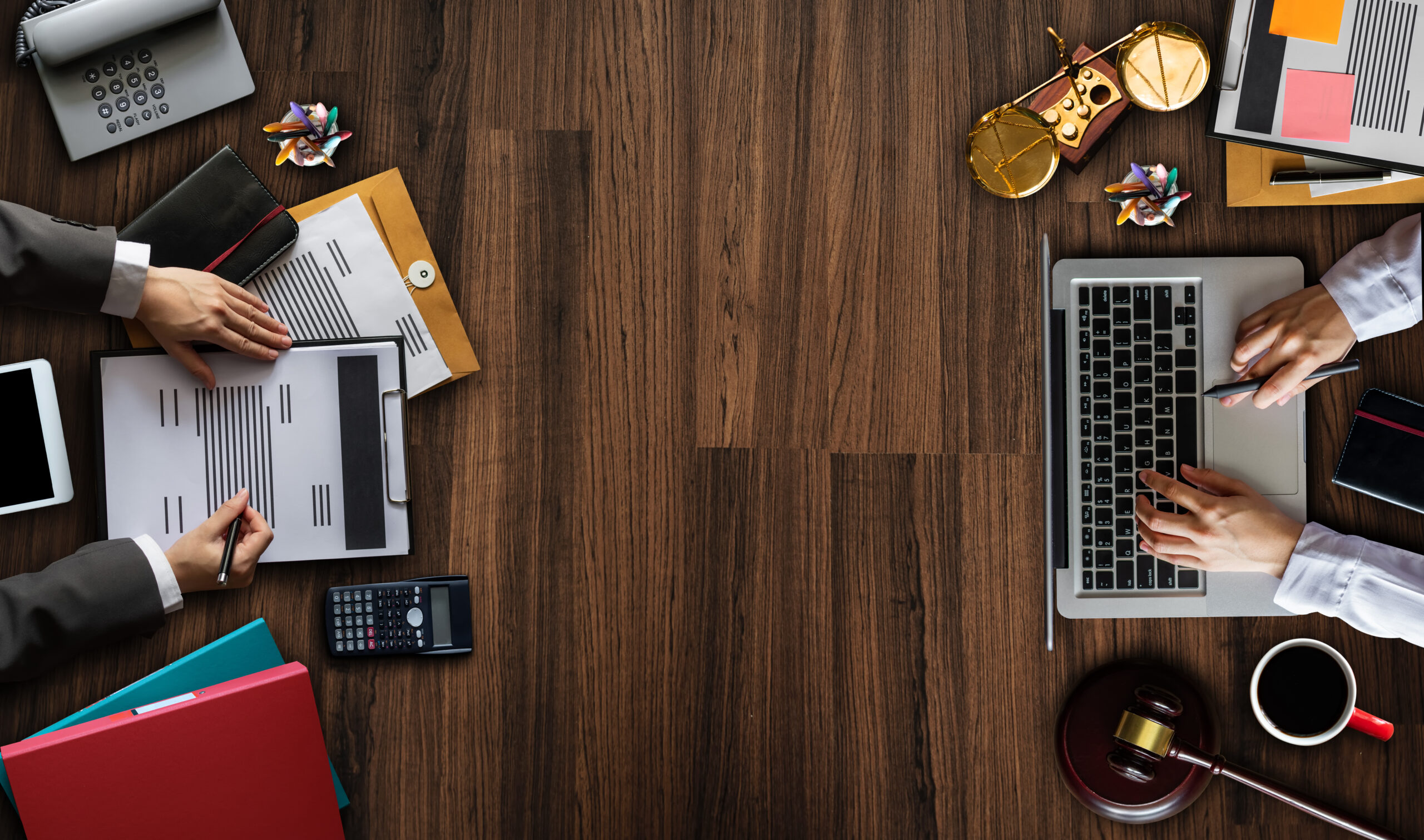 Top view Business and lawyers discussing contract papers with brass scale on desk in office. Law, legal services, advice, justice and law concept .